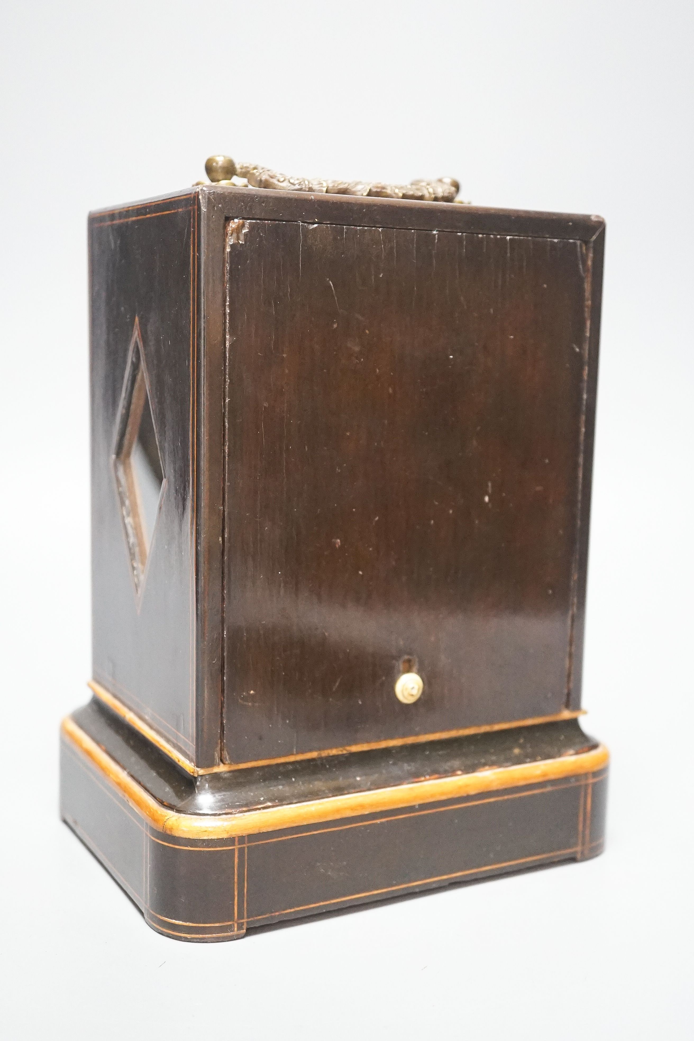 A 19th century French mahogany cased mantel clock, key and pendulum